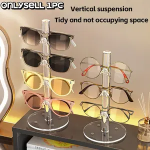Desktop acrylic multi-compartment eyeglass organizer is suitable for fashion eyeglasses, prescription eyeglasses, high-end dressing table eyeglasses, and eyeglasses display stands. It is also a modern display shelf and a minimalist organizer.