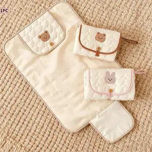 Cream Bear-Patterned Portable Diaper Changing Pad, Foldable and Breathable Polyester with Adjustable Strap for Travel, Secure Closure and Diaper Pouch, Travel Diaper Tote
