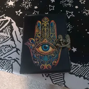 Hamsa Hand Journal with Eye Design and Locking Mechanism - Unique Artistic Eye Motif for Secure Note-Taking and Sketching