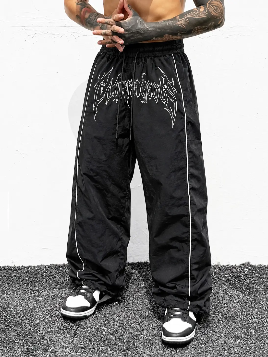 Men’s gothic-style printed loose athletic pants featuring contrasting color lines and an adjustable drawstring hem; street-style joggers, Y2K hip-hop casual running pants with an elastic waistband and lightweight fabric—urban fashion long pants suitable f