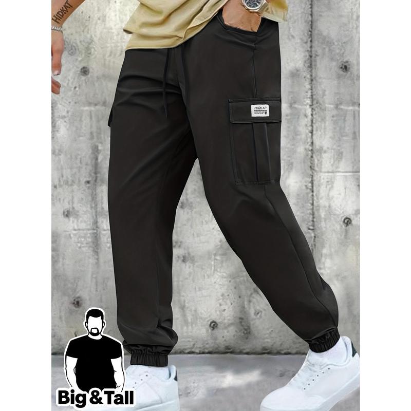 Plus Size Men's Plain Black Sporty Joggers - Lightweight Breathable Fabric, Adjustable Waist, Large Patch Pockets, Relaxed Fit, Durable Stylish Cargo Pants, Ideal for Outdoor Sports, Daily Wear