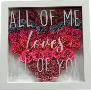 Shadow box with handmade rolled flowers