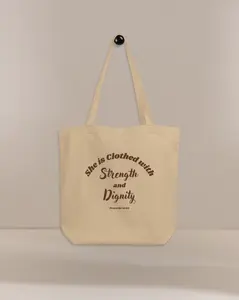 She is Clothed with Strength & Dignity Proverbs 31:25 Bible Verse Eco Tote Bag