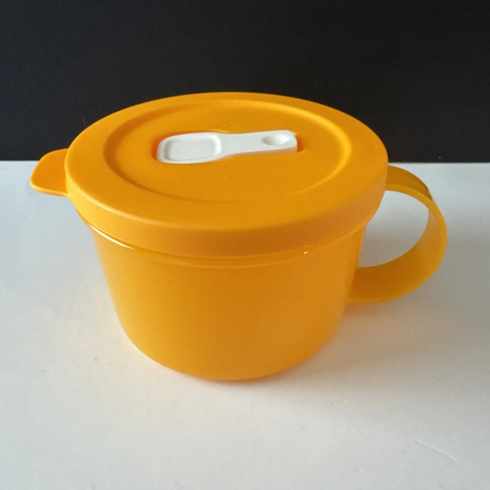 SINGLE Crystalwave 2-cup Soup Mug. Microwave safe: heat resistant up to 248°F (recommend 60% power) Leak proof seal prevents splatters and valve seal lets steam escape. Stain Guard helps reduce staining. Perfect for single servings. Stackable.