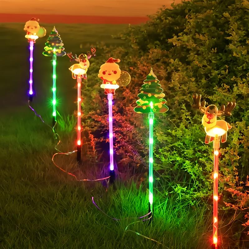 6-Pack Solar Christmas Decorative Lights Christmas-Themed LED Fairy Lights Featuring Santa Claus, Christmas Trees, and Reindeer Plastic Material IP44 Waterproof Rating Ideal for Lawn and Garden Pathway Decorations Holiday Decorations