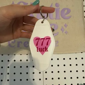 777 luck manifestation angel number motel style white keychain