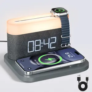 4-in-1 Wireless Charging Station – Fast charging for iPhone, AirPods & Apple Watch. Compact, portable design with USB cable and rubber finish. Sleek gray with built-in digital clock. Ideal for home or office.