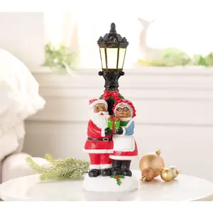 Santa and Mrs.Claus with Illuminated Lamp Post by Valerie