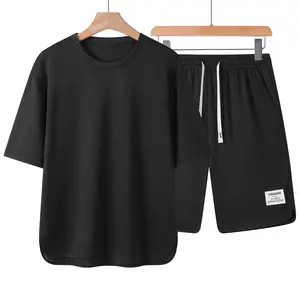 Men’s summer solid-color two-piece set featuring a casual crew-neck short-sleeve shirt paired with drawstring shorts, suitable for everyday and outdoor leisure wear.