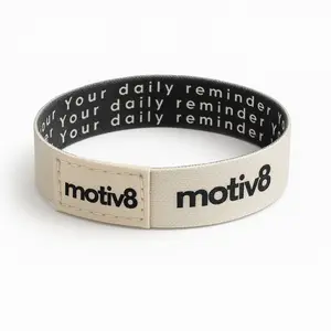 Motiv8 Your Daily Reminder White Wristband with Motiv8 Logo and Text Design