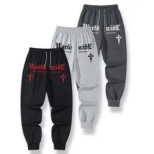 Trendsetting Men's Drop Crotch Joggers Highlighted by a Thought-Provoking Repeat Design Featuring "World" Lettering and the Affirmation "Embrace The Power Of Yourself"