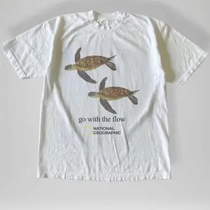 Gildan Men's and Women's T-shirt, National Geographic turtle  go with the flow  tee, Animal tee, Y2k Unisex Graphic Tees Gothic Grunge Emo Scene Amity Affliction Style Clothes Menswear Womenswear Streetwear