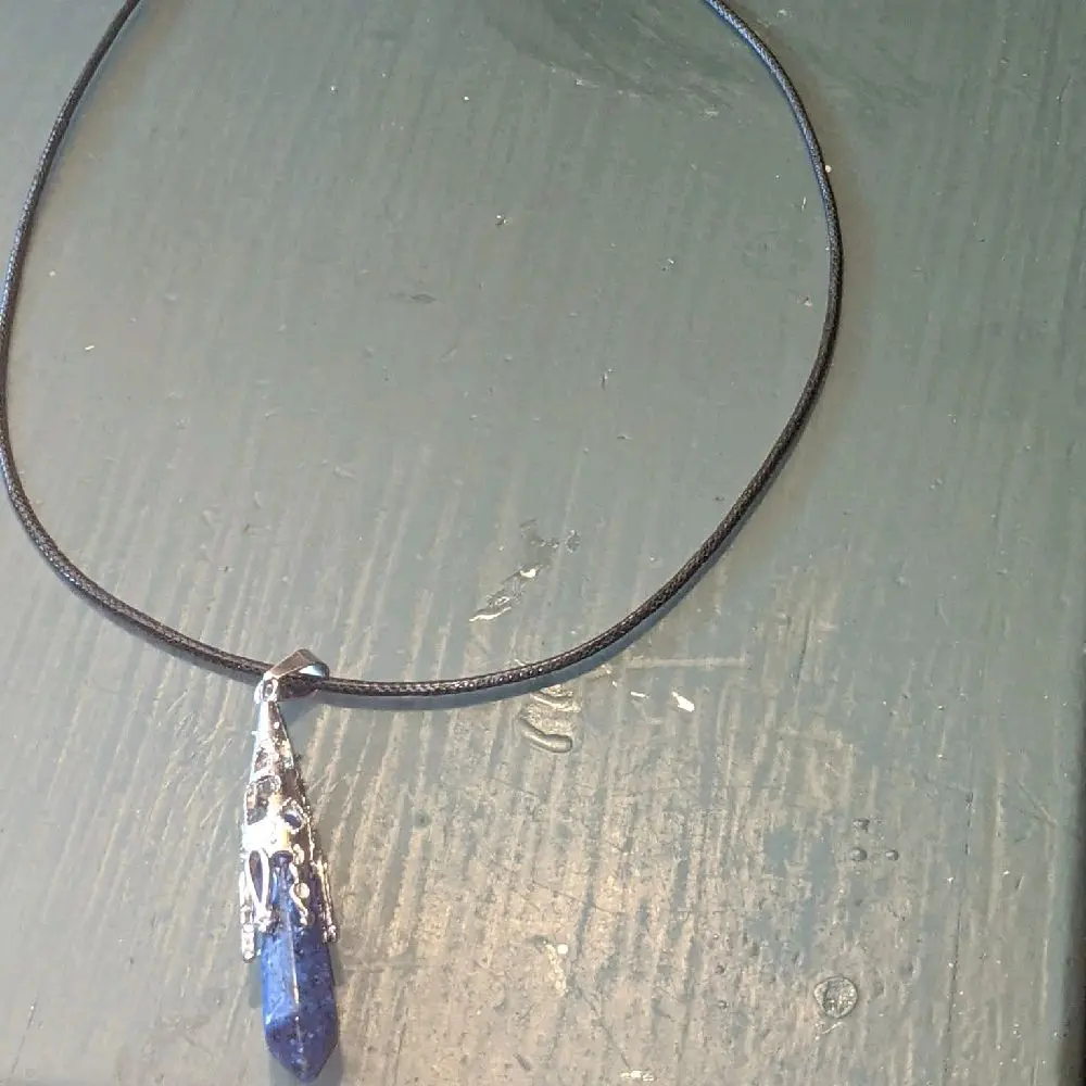 Blue lapis necklace on leather Cord