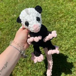 Crochet Opposum Baby Snuggler - Adorable Black and White Design with Pink Accents for Cozy Comfort