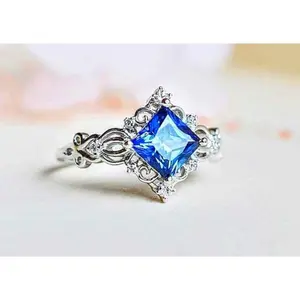 Blue Princess Cut Crown Halo Silver Ring