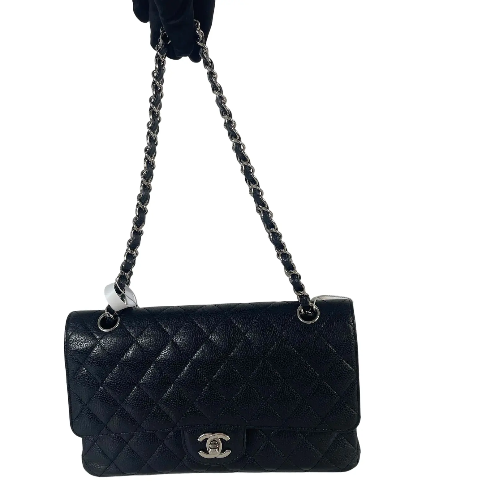 Pre-owned CHANEL Black diamond-quilted caviar grained leather Crossbody Bags black caviar leather Medium Classic Flap handbag, silver tone CC turnlock, leather interwoven chain strap.