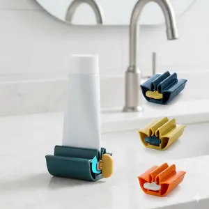 Space-Saving Toothpaste Dispenser & Holder, Bathroom Organizer with Strong Adhesive, Anti-Slip Squeeze Tool for Toothpaste Tube, Effortless Wall-Mounted Storage for Countertop, Waterproof and Durable.
