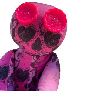 The Santa Muerta Doll