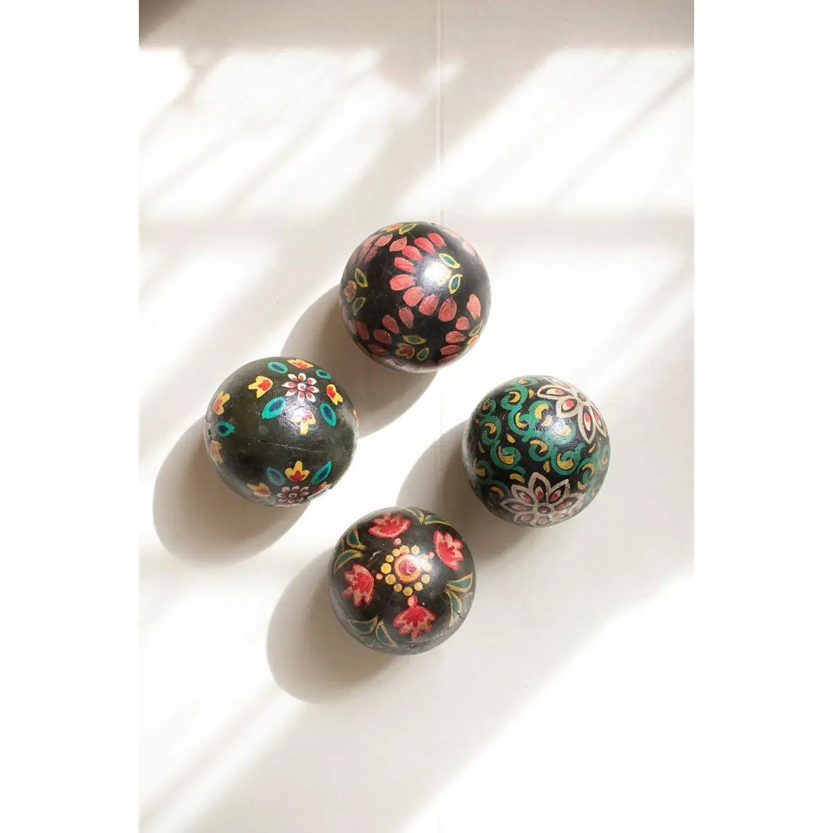 Set Of Four Hand-painted Wooden Spheres