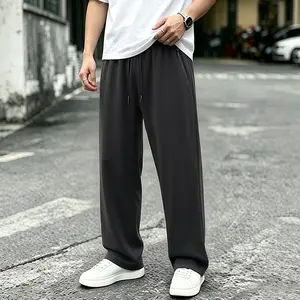 Men’s cargo pants with contrast stitching, wide legs, and an elastic waistband—soft, relaxed fit, perfect for urban streetwear, casual everyday outfits, and a modern style.