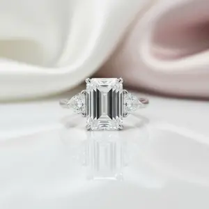 Emerald Cut White Sapphire Three Stone Engagement Ring