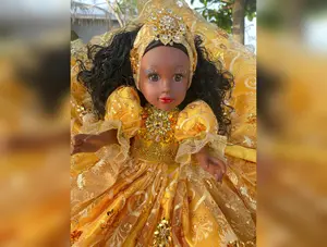 Muñeca vestida de oshun  
