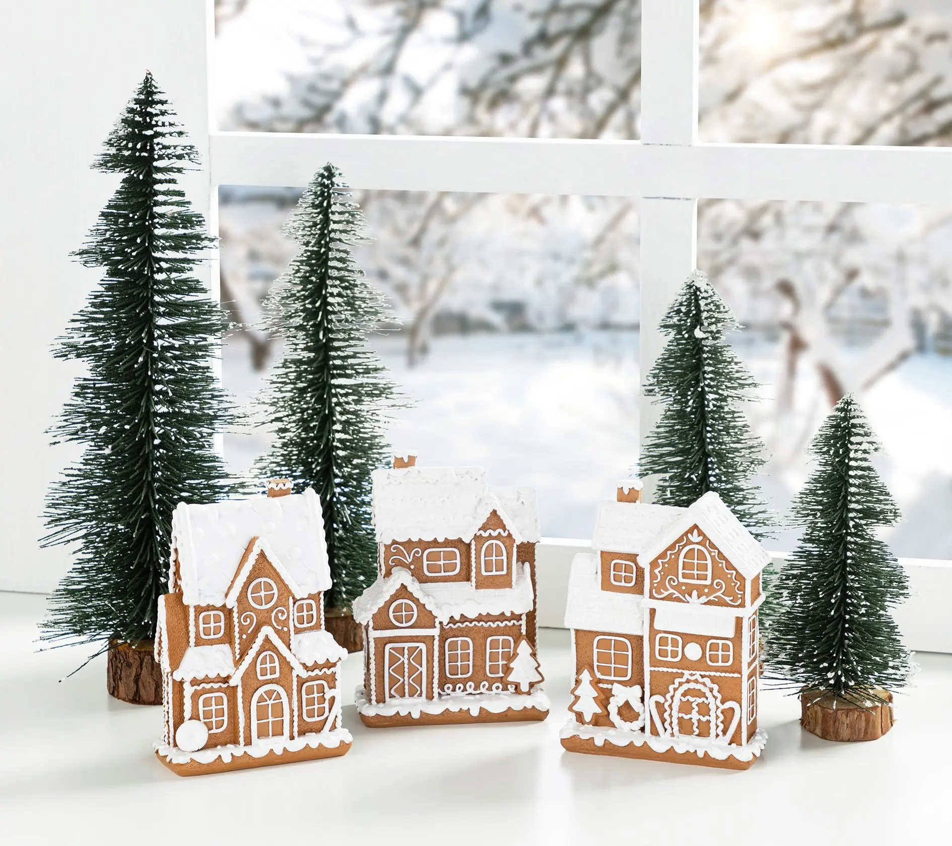 Glitzhome 5.5"H Christmas Resin Gingerbread Houses Set of 3 Glitzhome 5.5"H Christmas Resin Gingerbread Houses Set of 3