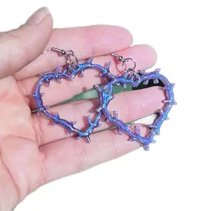 jackie winn // tough love barbed wire heart earrings color shifting
