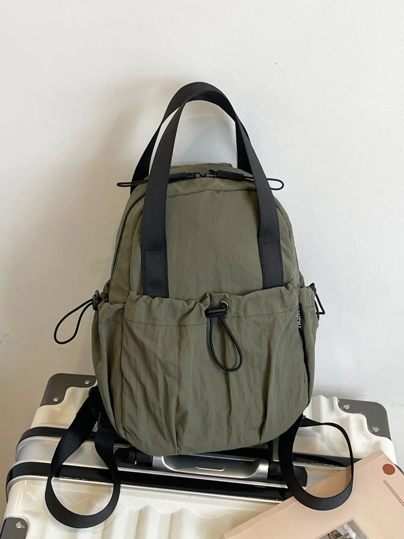 Practical solid color Casual Lightweight backpack, crossbody bag, multi pocket design, can accommodate tablets and files, suitable for commuting and shopping, Traveler essentials backpack
