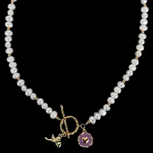 Cupid Pearl Necklace with Purple Heart Charm and Gold Toggle Clasp Elegant Pearl Strand Jewelry