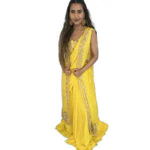 Yellow colored stitched saree lehenga with jacket