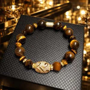 Tiger Eye Natural Stone Bracelet with Gold Accents and Intricate Design for Stylish Wear