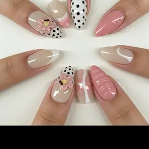 Elegant Nail Art Set with Floral and Polka Dot Designs in Soft Pink and Beige Shades for a Chic Look size medium nail bed.