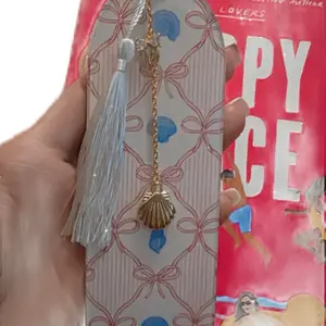 Soft Seashell Daydream Handmade Bookmark with Pastel Bow Print & Gold Shell Charm - Elegant White Silk Tassel for Journals or Books