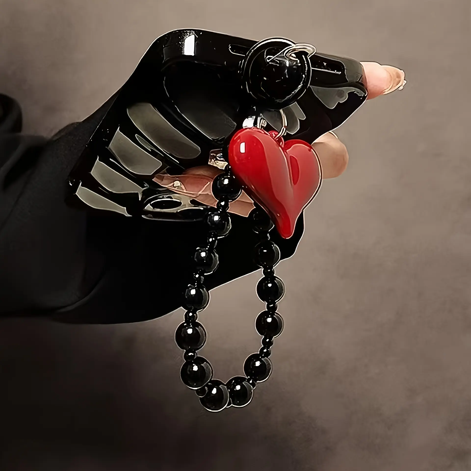 1 red heart-shaped black bead mobile phone chain, handmade, can be used as a hanging accessory for mobile phones, keys, etc., and can also be given as a holiday gift for birthdays, Christmas, and New Year to family members Cute Cell Phone Charm