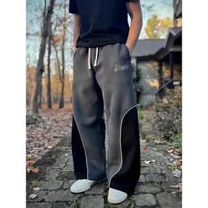 Unisex neutral long pants in street style—trendy fashion sports casual joggers with patchwork design, drawstring, letter embroidery, Y2K hip hop aesthetic, popular for autumn and winter.