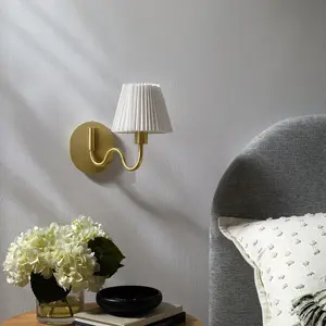 Wave Squiggle Arm Wall Sconce in Brass
