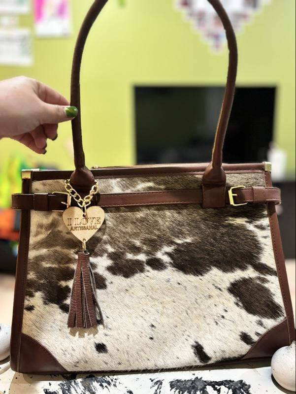 Cowhide Handbag with Heart Charm and Tassel Detailing