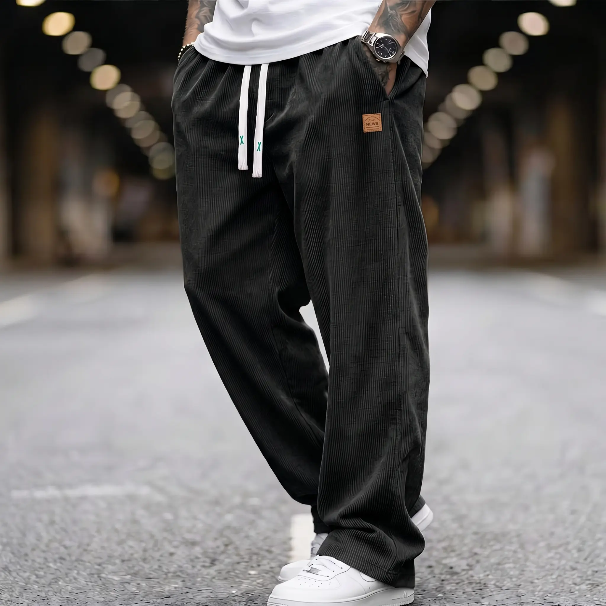 Men’s all-season corduroy casual pants in charcoal gray, textured leather-effect label, drawstring, loose straight fit, suitable for all tops