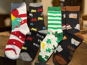 A 4 Pairs of Socks Bundle featuring Motorcycle, Christmas, Book and Irish-themed Socks