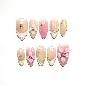 Elegant Nude-Pink Almond Press-On Nails with 3D Embossed Details & Delicate Pearl Accents Minimalist Nail Art for Daily Wear and Bridal Looks Subtle Shimmery Finish