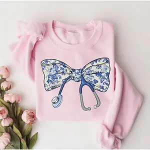 Nurse with Bow Sweatshirt, Stethoscope Hoodie, Nurse Gift Shirt, Cute Nurse Crewneck, Nursing School Graduation Gift Cotton Fabric Unisex Womenswear Fit