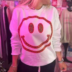 Giant leopard and red smiley face  crew tee