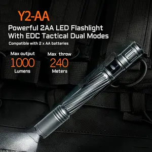 Portable pen-style flashlight with rear switch, includes two AA batteries, suitable for emergency lighting, nighttime patrols, and emergencies.