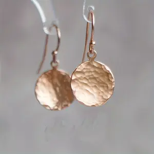 A Pair Of Minimalist Golden Concave And Convex Small Round Earrings For Women, With A Simple And Elegant Geometric Circular Design In European And American Style.