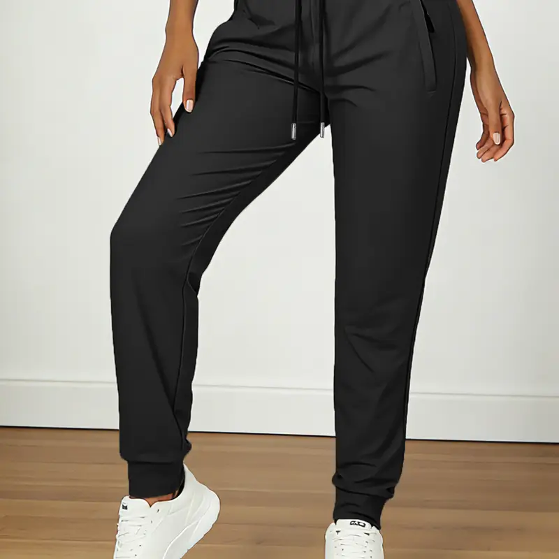 Women’s quick-dry jogger pants with zippered pockets, elastic drawstring waist, cuffed ankles, lightweight athletic running gym trousers