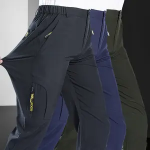 New all-season men’s outdoor cargo pants with multiple pockets; breathable fabric suitable for everyday wear, fitness, outdoor activities, and hiking; ideal as a holiday gift.