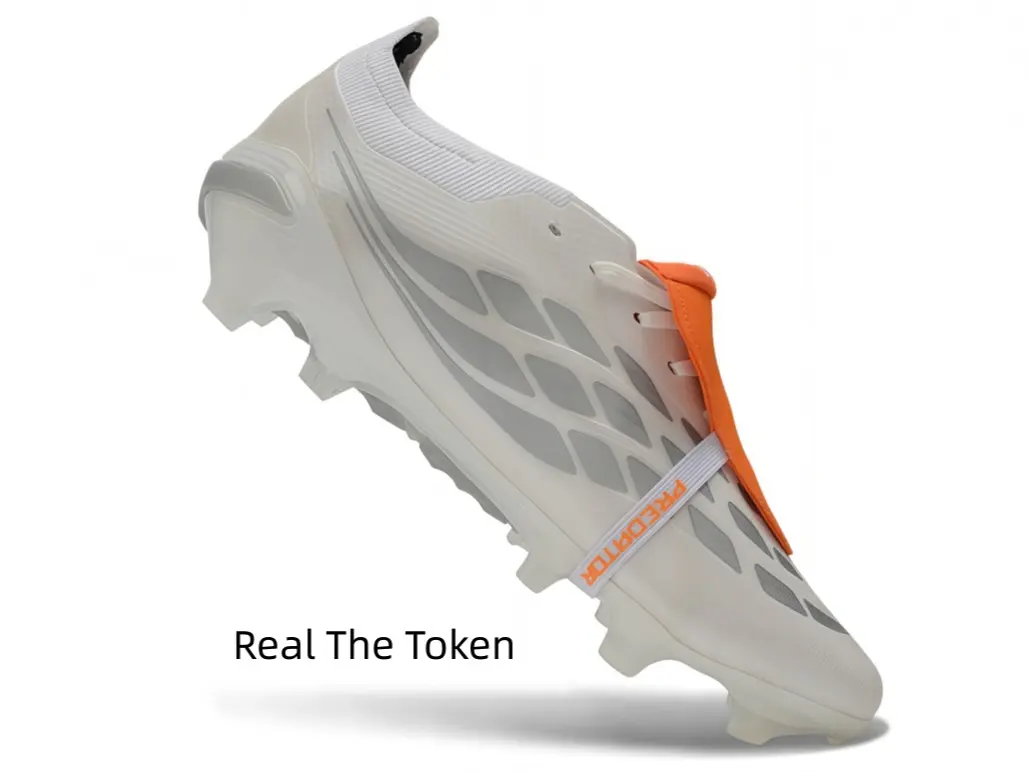 Streamlined turf soccer footwear with reflective glossy red surface, thin upper delivers sensitive touch for precise passes, molded red studs ease foot fatigue over long training sessions.