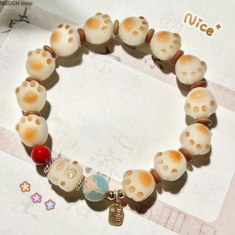Cat Paw Beaded Bracelet with Lucky Charm, Kitten Bead, Red-Blue Accents, Cream-Tan Tones, Ideal for Cat Lovers & Everyday Wear