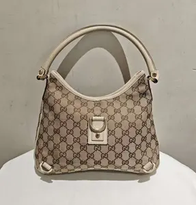Pre-owned GUCCI Canvas Shoulder Bags Abbey D Ring hobo bag in beige GG monogram with off white leather trim
